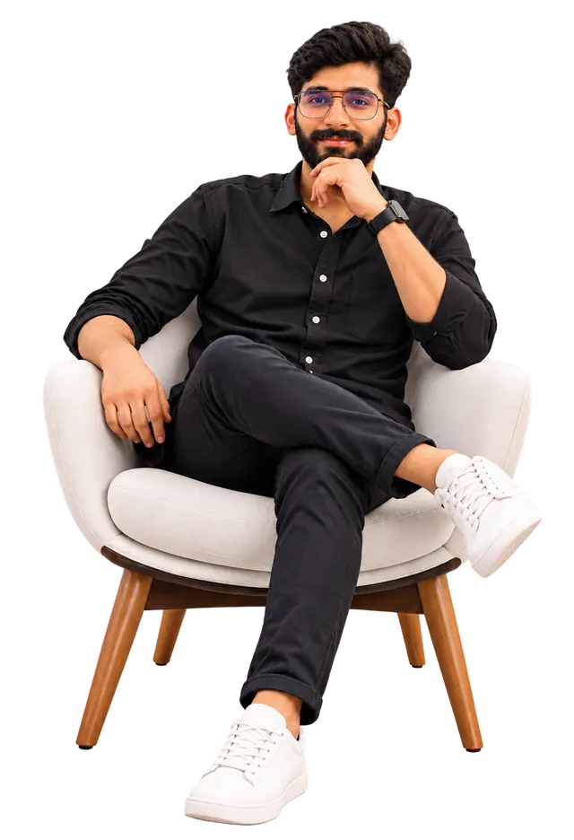 Muzammil Abbas seated in a beige chair